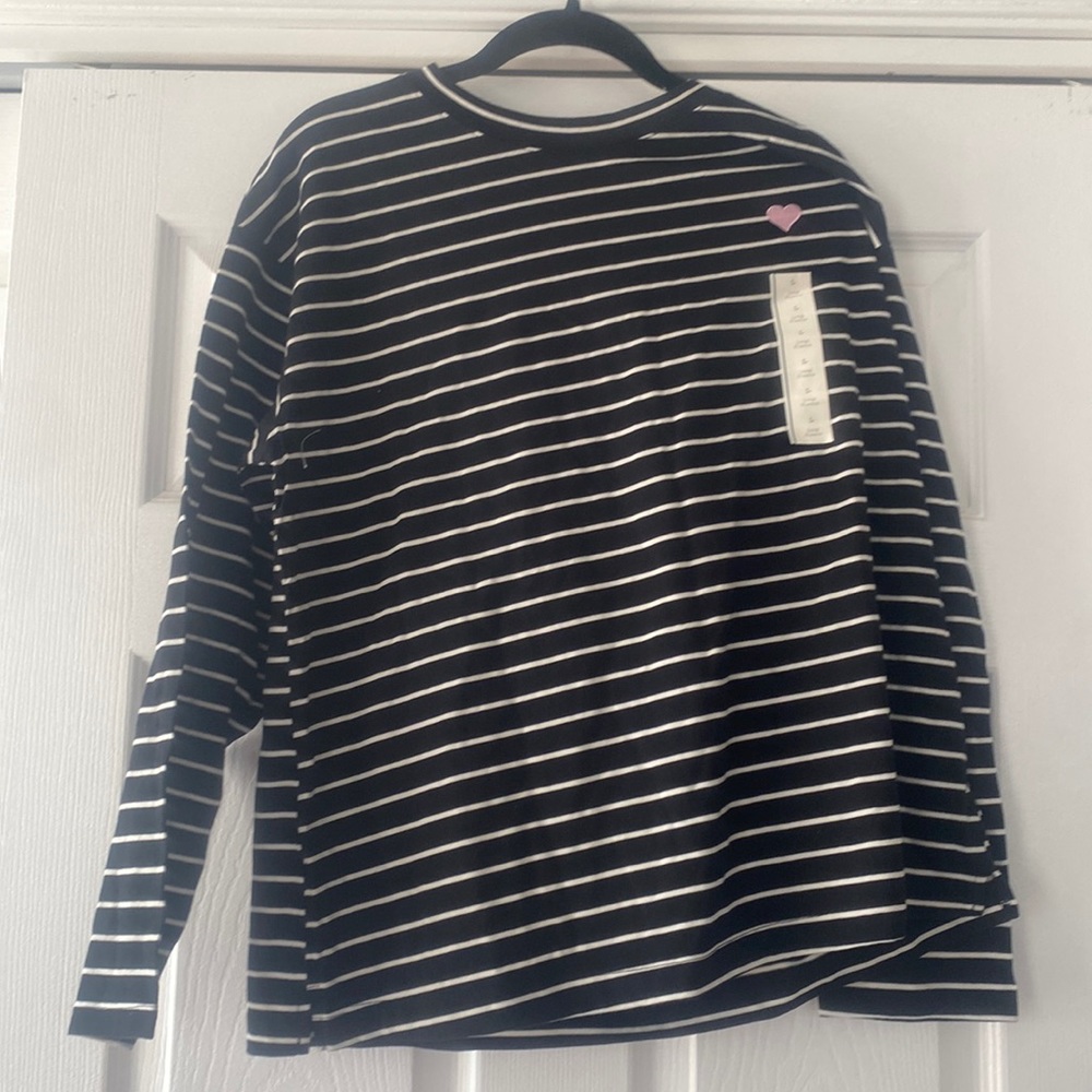 A black and white long sleeve with heart,top right.